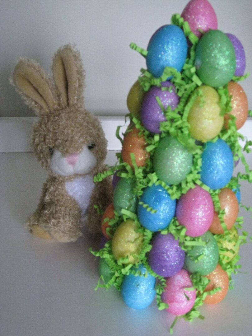 easter eggs, various incentives inside on a foam tree and tooth picks to hold in place